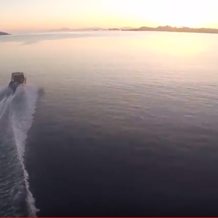Splash Drone Chasing Boat at Speed