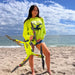 Person holding Xpece ONE fishing drone on a beach
